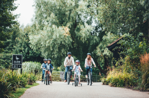 family cycling at lower mill estate